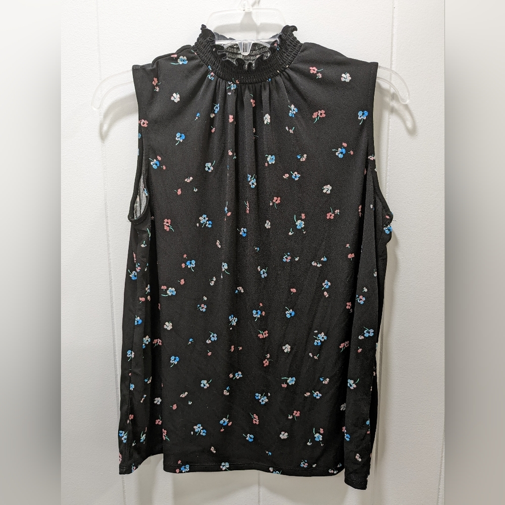 Shirt by Elle, size S, black with small flowers in pink and blue.